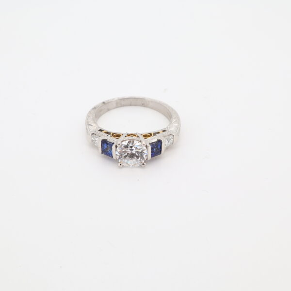 Platinum and 18KY Sapphire, Diamond, and CZ Ring