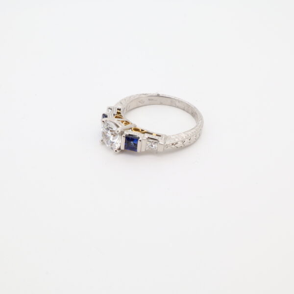 Platinum and 18KY Sapphire, Diamond, and CZ Ring