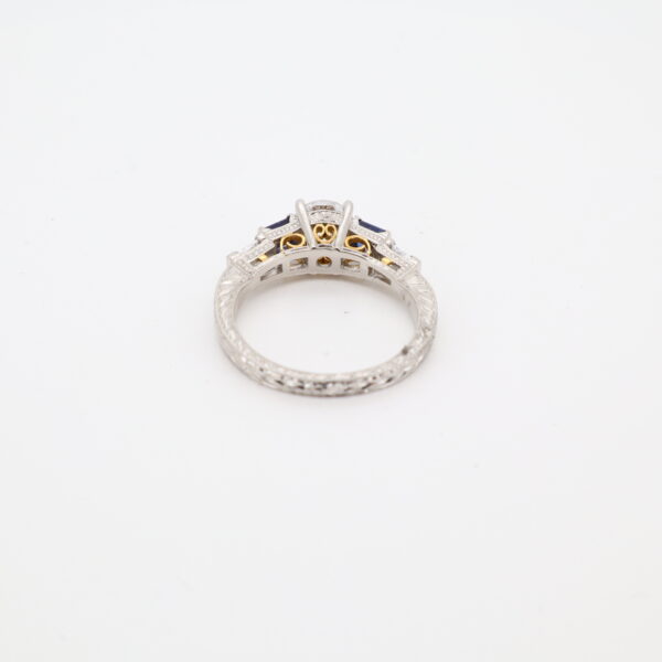 Platinum and 18KY Sapphire, Diamond, and CZ Ring